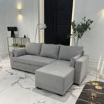 BUDWING Leah Corner Sofa Bed 3 Seater – Reversible Chaise Longue and 2 Decorative Cushions – Polyester Upholstered – Modern Style – 233 x 124 x 69 cm – Light Grey